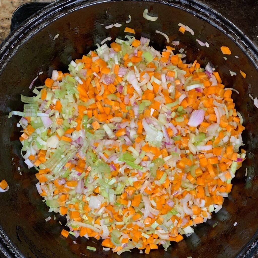 Diced vegetables sweating on stove 